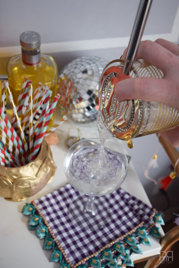 bar cart drink being poured