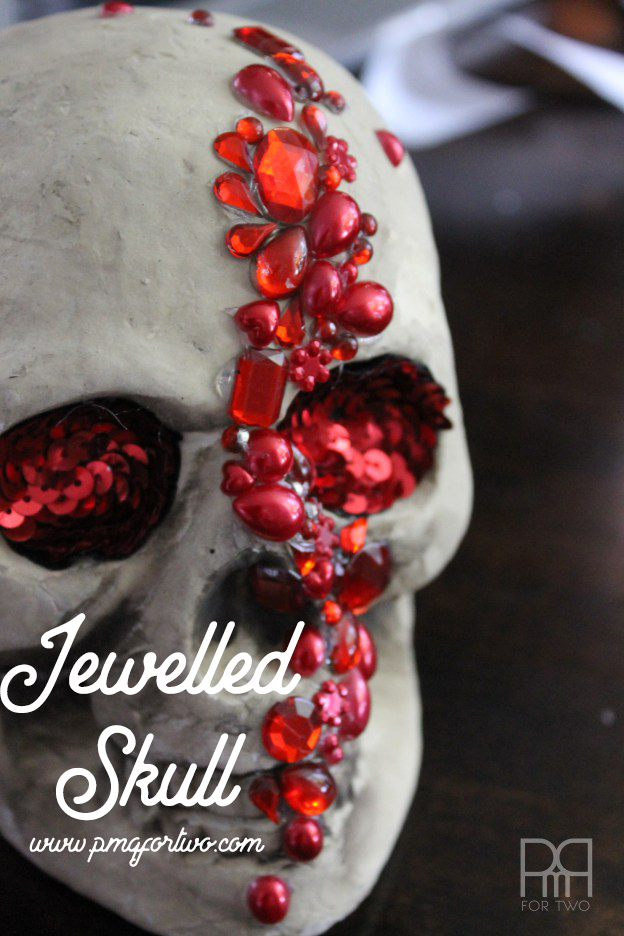 Make your own glam DIY Jewelled Skull for under 6$ using supplies from the dollar store and a little bit of hot glue. Glam decor here we come!