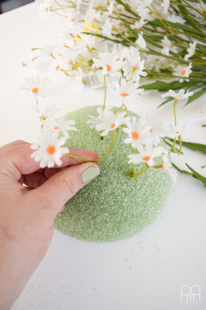 Spring Wreath in process with daisies