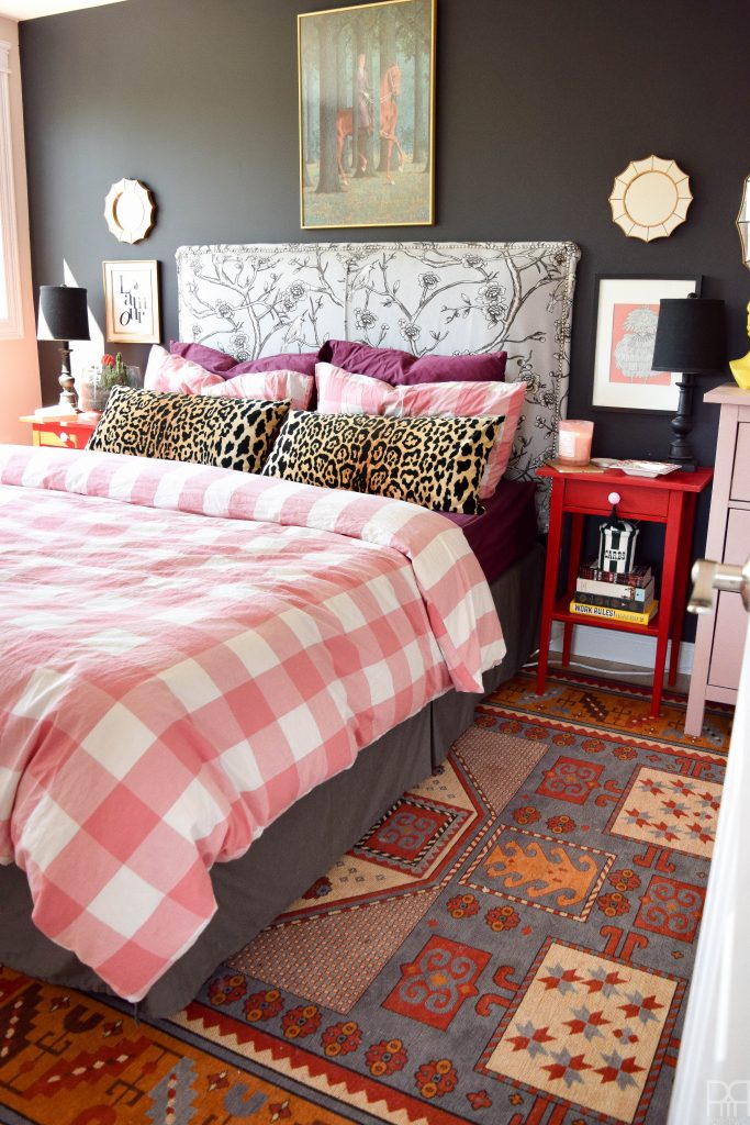 A Black & Bold master bedroom that shines in a rental house. Bold accents and saturated hues complete this space.