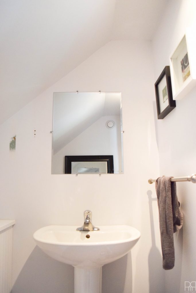 Tile a wall in your rental using peel & stick tiles.