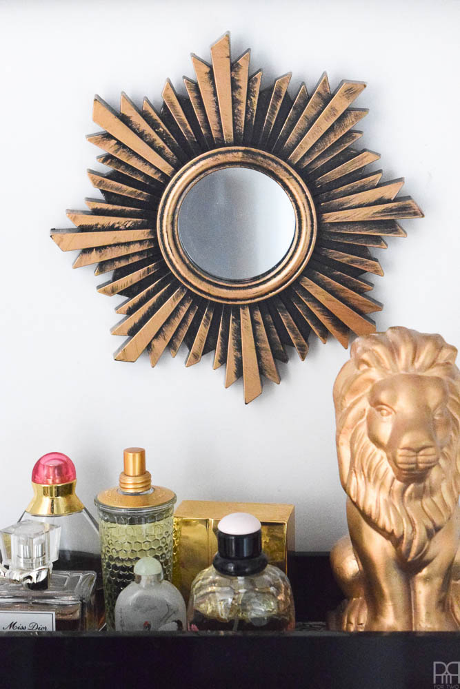 sunburst mirror and lion