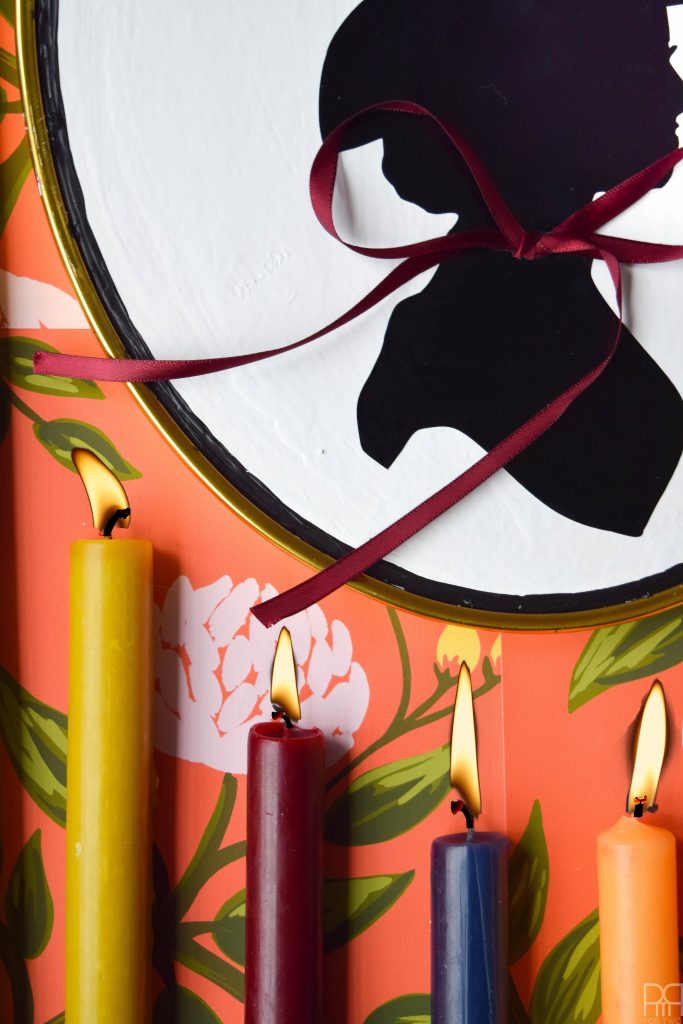 make a Witch Silhouette Decor using your Cricut and thrifted frames. Halloween decor doesn't have to be cheesy to look good.