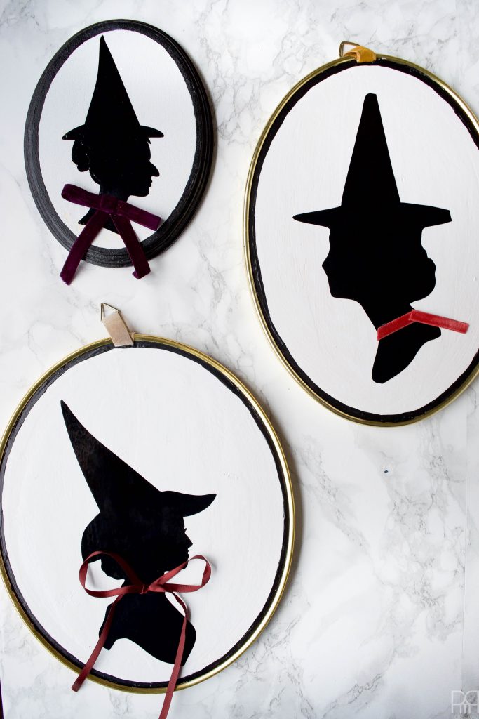 Make a DIY Witch Silhouette Decor using your Cricut and thrifted frames. Halloween decor doesn't have to be cheesy to look good.