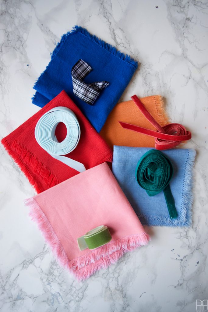 DIY Fabric Cocktail Napkins are where it's at! Wash, don't toss, once the party's over. You can make these cloth ones look extra fancy.