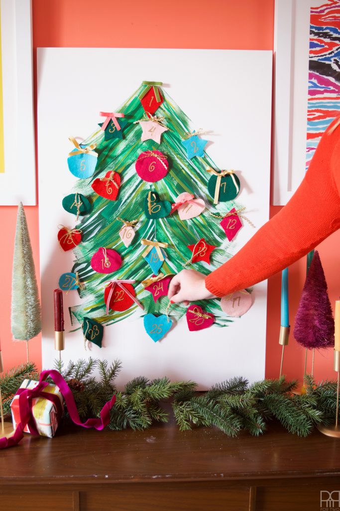 Create a magnetic and fabric advent calendar for the holidays using your Cricut!