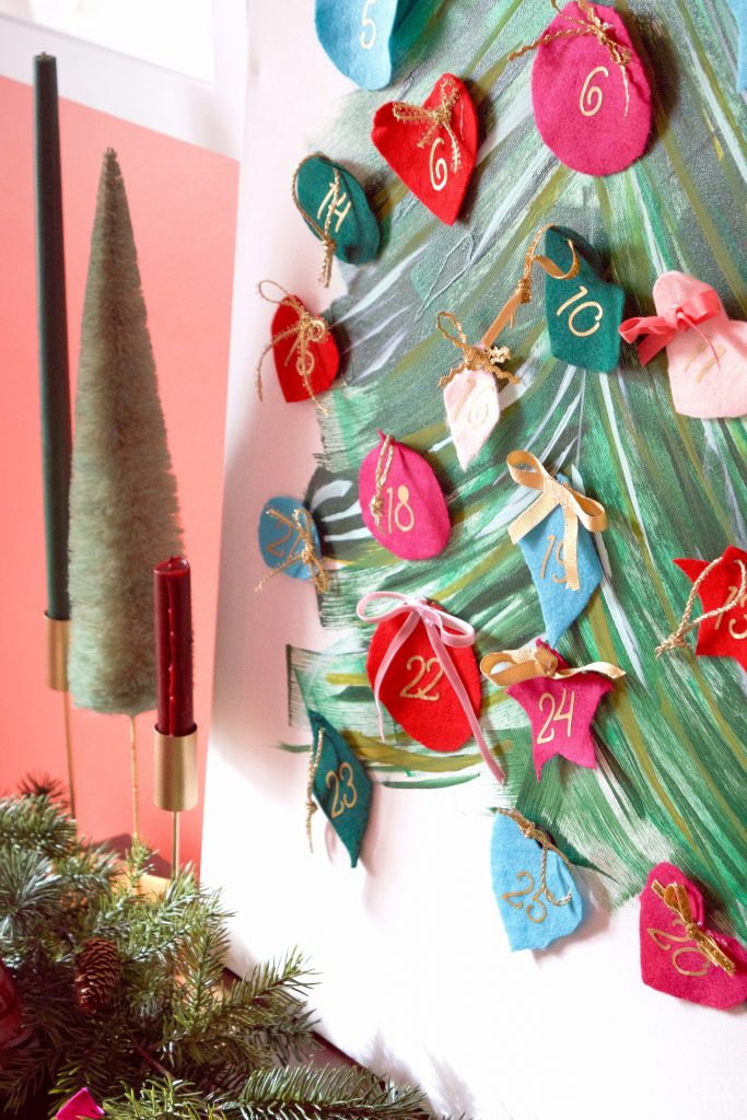 Create a magnetic and fabric advent calendar for the holidays using your Cricut!