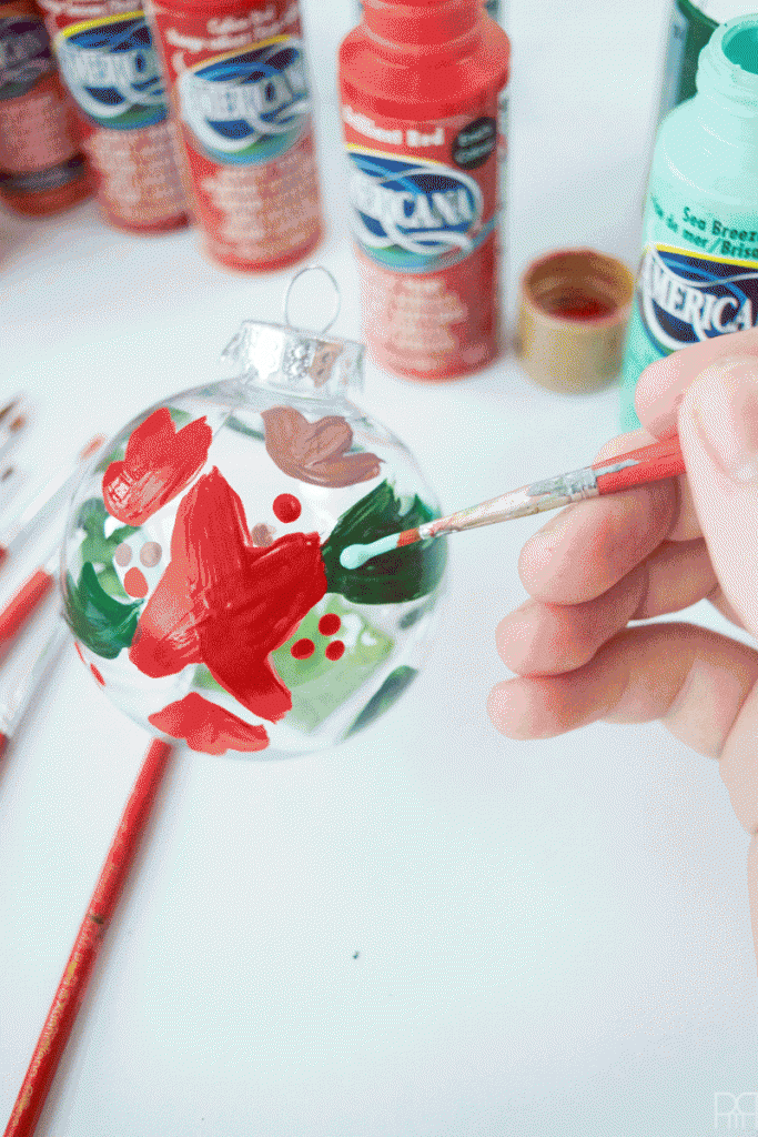 Who says Christmas has to be just red and green? Create beautiful floral christmas ornaments with some paint!