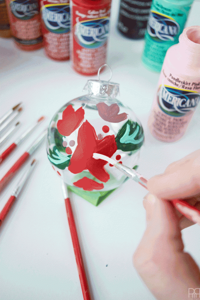 Who says Christmas has to be just red and green? Create beautiful floral christmas ornaments with some paint!