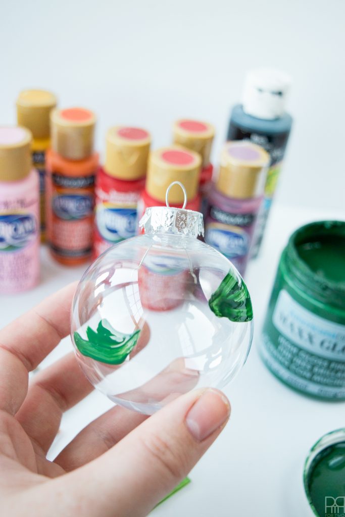 Who says Christmas has to be just red and green? Create beautiful floral christmas ornaments with some paint!