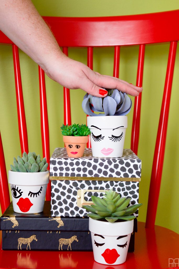 What do you do with all those vinyl scraps?! You make Vinyl Face Succulent Planters of course!