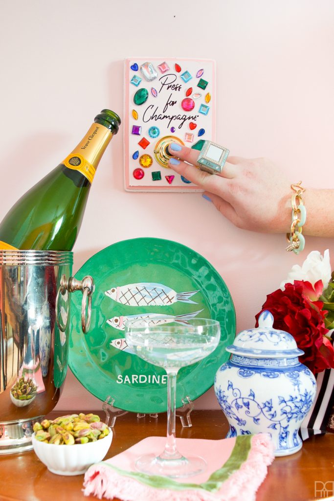 Wouldn't cocktail hour be simpler if there was a magical diy champagne buzzer? Well now there is... or at least one you can DIY. Full deets on the blog