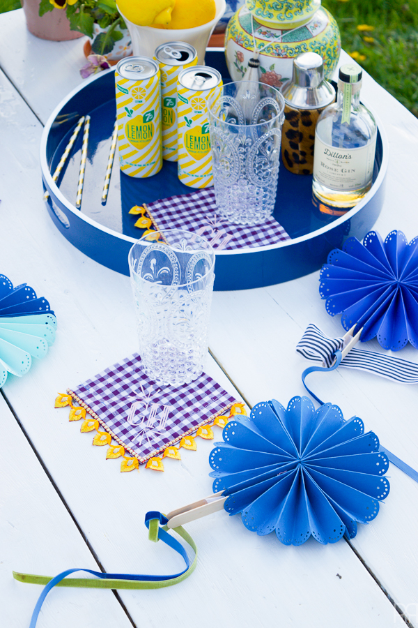 Using my Cricut Explore Air 2 and some colourful card stock and ribbons, I made beautifully paper fans for summer entertaining and outdoor living. Come see how you can make a set for yourself!