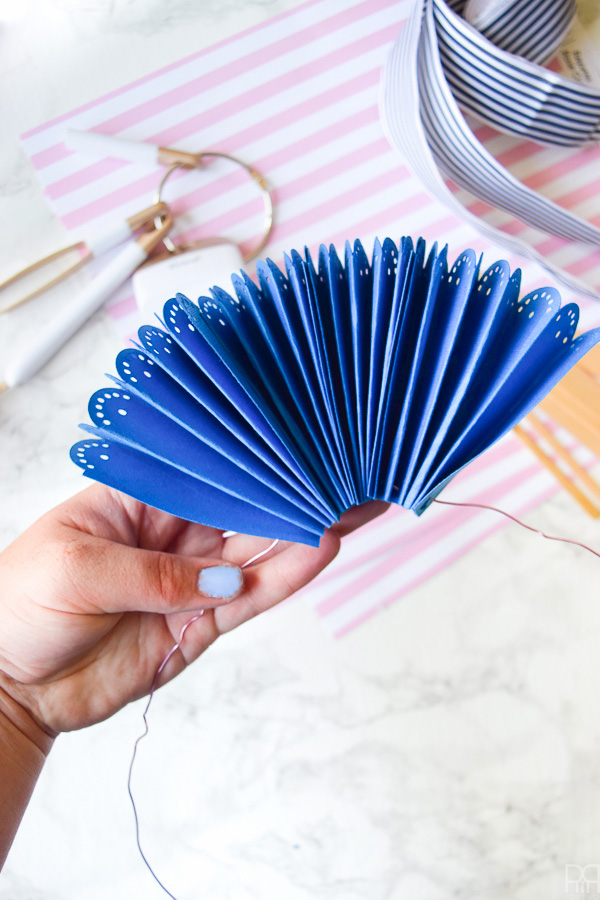 Using my Cricut Explore Air 2 and some colourful card stock and ribbons, I made beautifully paper fans for summer entertaining and outdoor living. Come see how you can make a set for yourself!