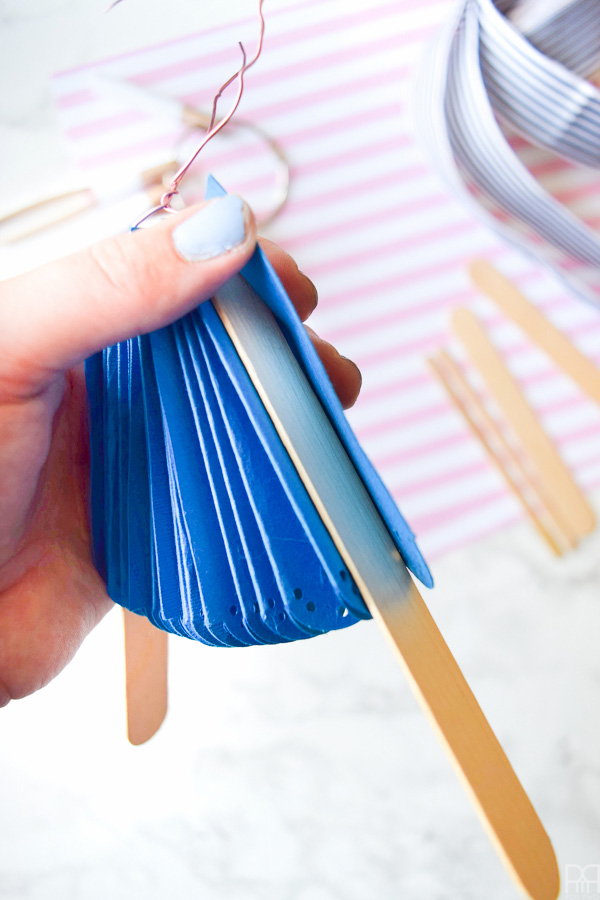 Using my Cricut Explore Air 2 and some colourful card stock and ribbons, I made beautifully paper fans for summer entertaining and outdoor living. Come see how you can make a set for yourself!