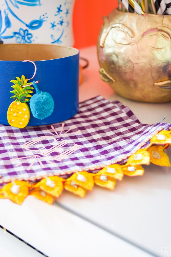 Make your own pineapple wine glass charms using acrylic paint and cute pom-poms. These cuties will look good with any glass of wine, rose, or other! 