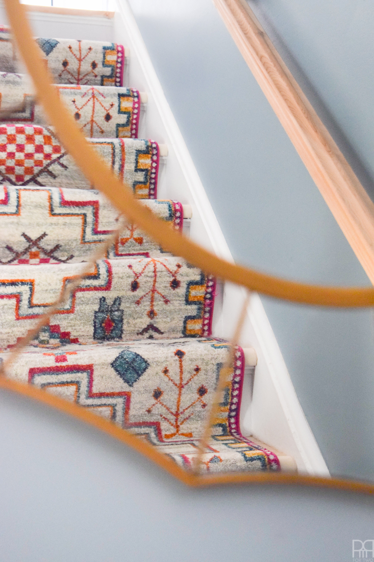 Using runners from Rugs USA I gave our staircase a makeover in a renter friendly way. Our staircase now looks like the main artery in our colourful and bold home instead of a space to hide. Head to the blog to see what products I used and why it's renter friendly.