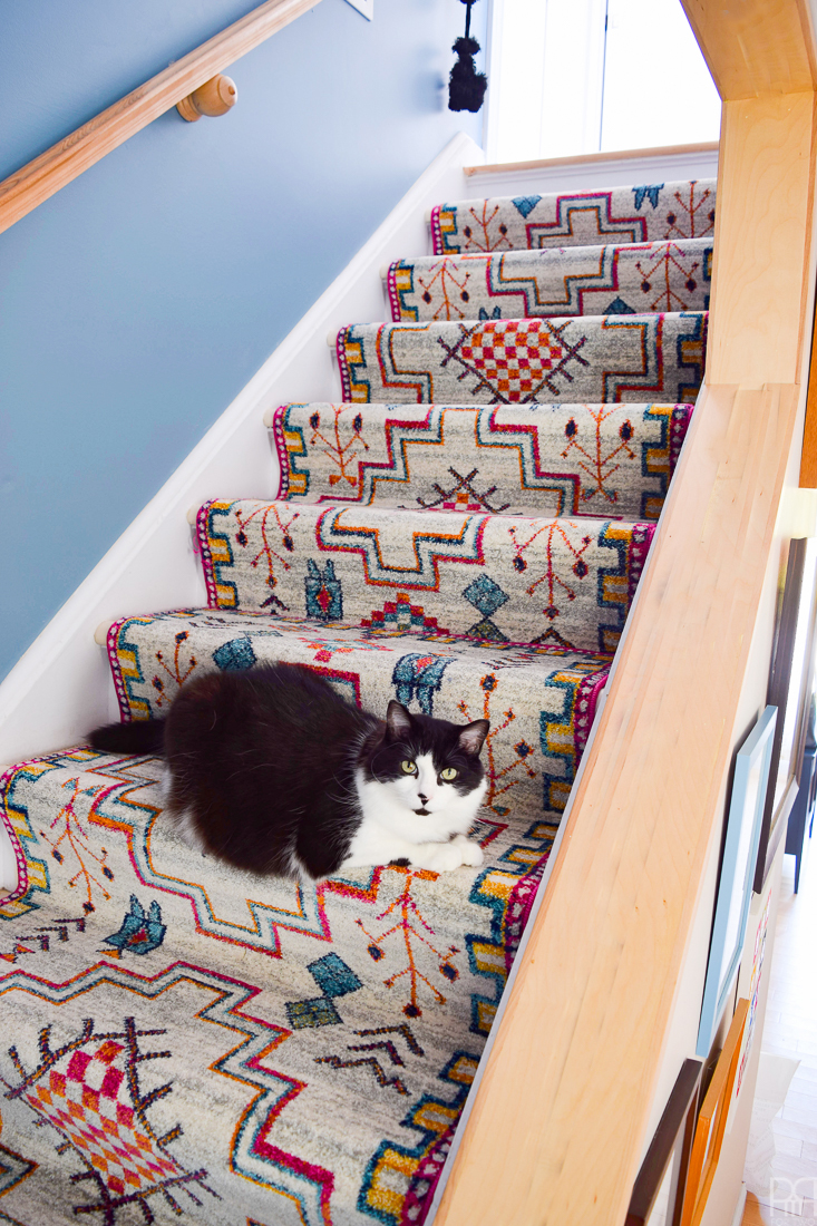 Using runners from Rugs USA I gave our staircase a makeover in a renter friendly way. Our staircase now looks like the main artery in our colourful and bold home instead of a space to hide. Head to the blog to see what products I used and why it's renter friendly.