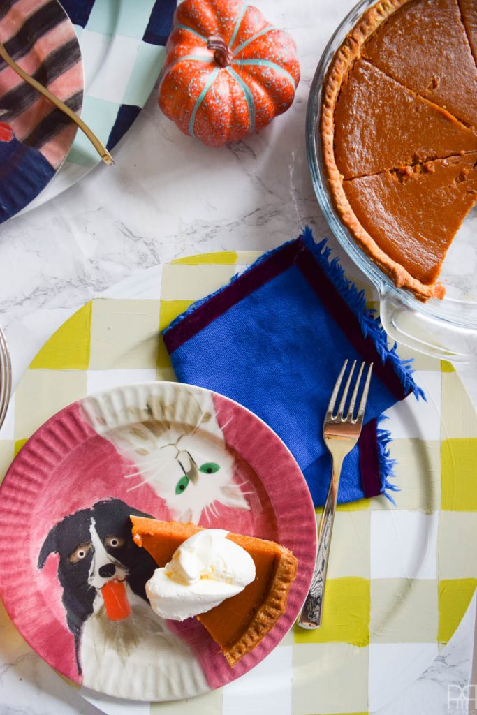 Using Americana's chalky finish paint you can cover-up ugly plastic plates and create beautiful painted plaid chargers.