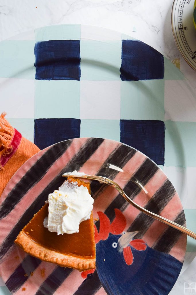 Using Americana's chalky finish paint you can cover-up ugly plastic plates and create beautiful painted plaid chargers.
