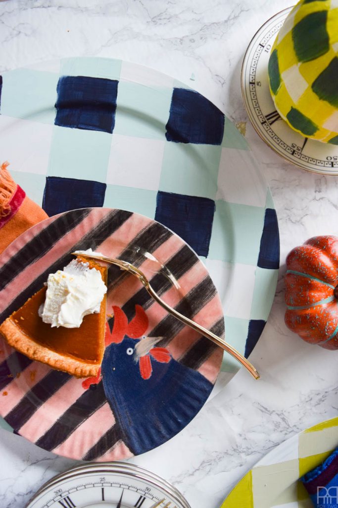 Using Americana's chalky finish paint you can cover-up ugly plastic plates and create beautiful painted plaid chargers.