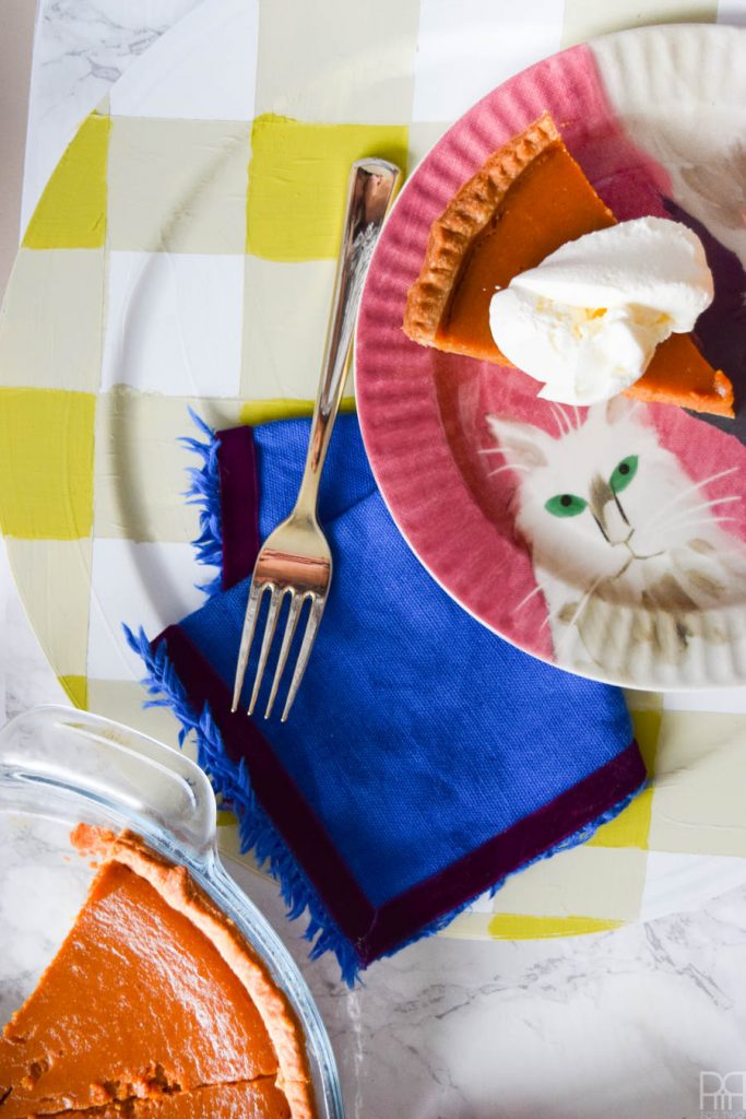 Using Americana's chalky finish paint you can cover-upugly plastic plates and create beautiful painted plaid chargers.