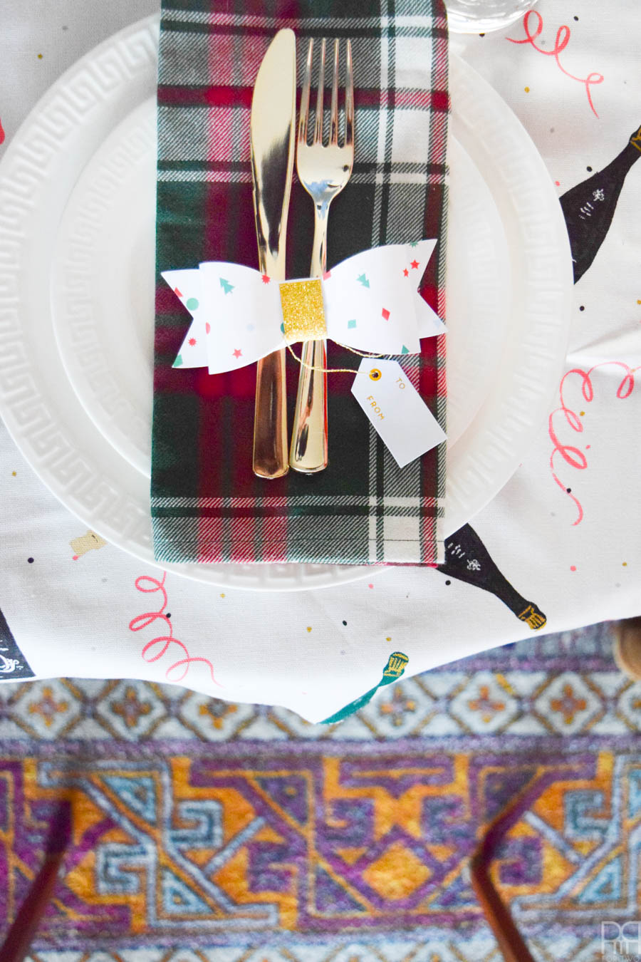 Create a colourful and curated Christmas tablescape with pops of retro and nostalgia. The look is festive and trendy without being overpowering, and my Christmas gift centerpiece is pretty darn impressive.