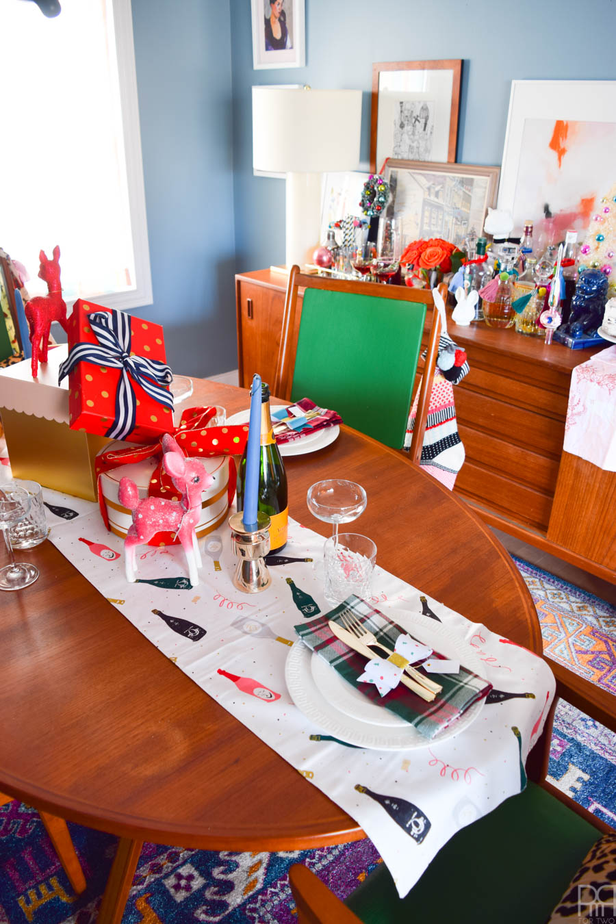 Create a colourful and curated Christmas tablescape with pops of retro and nostalgia. The look is festive and trendy without being overpowering, and my Christmas gift centerpiece is pretty darn impressive.