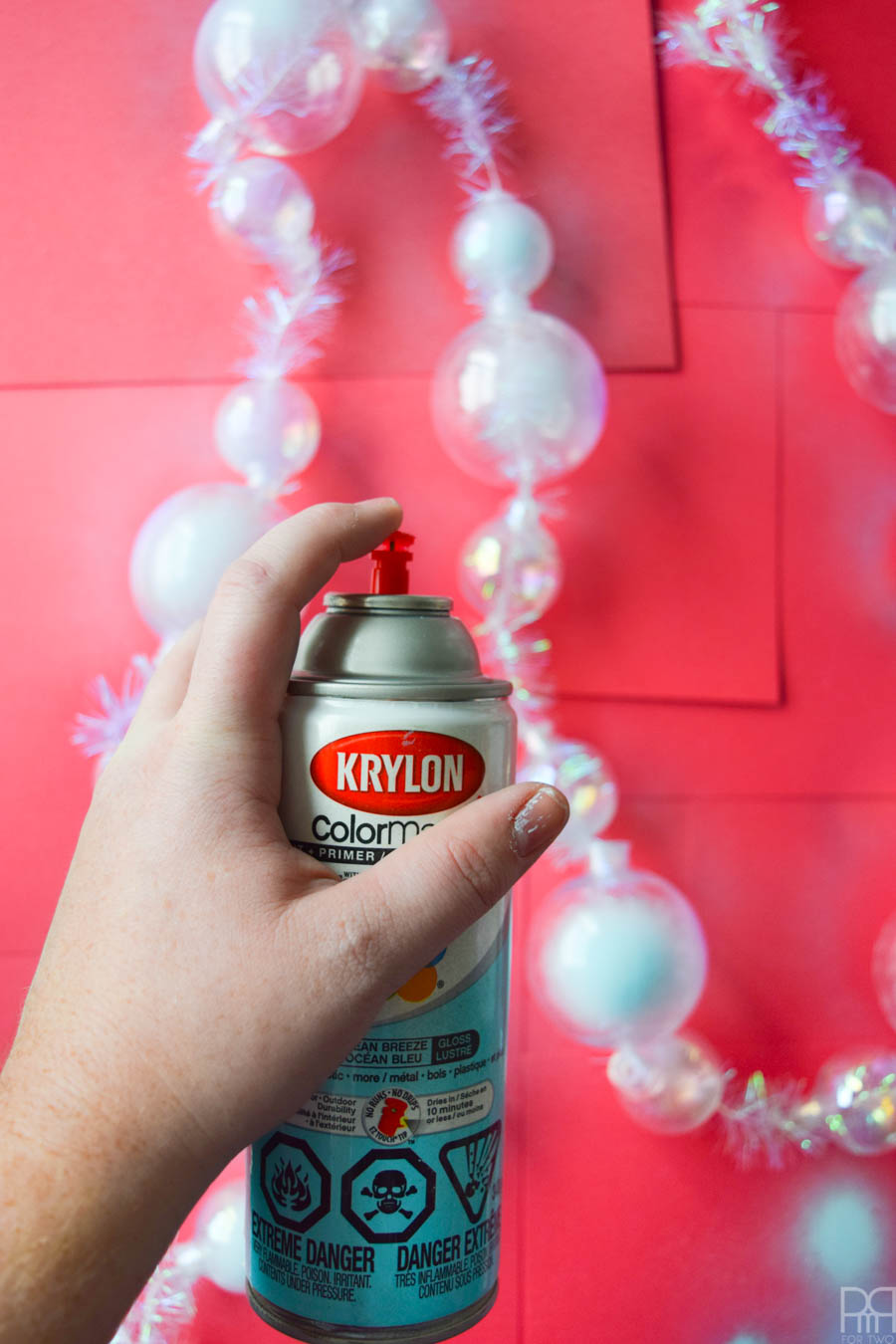 Spend an afternoon creating the perfect Christmas garland using old ornaments and some Krylon spray paint for a beautifully dusted look. Unicorns do exist y'all, and this garland is proof. #krylon #spraypaint