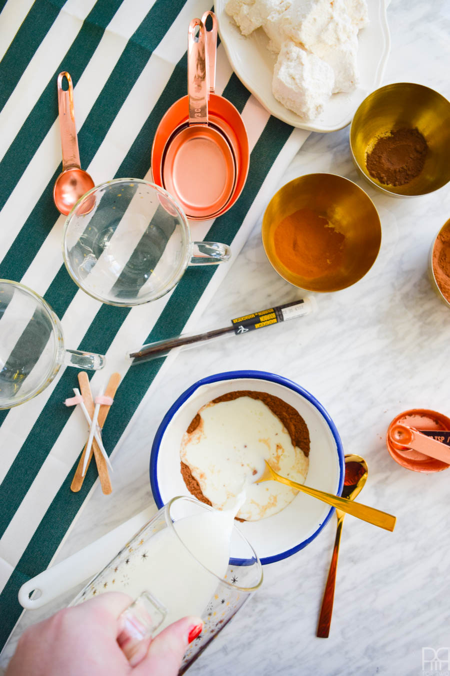Cuddle up with a warm cup of Spicy Hot Chocolate & Homemade Marshmallows this winter. The recipe is dead simple, super tasty, and very appropriate for winter activities.