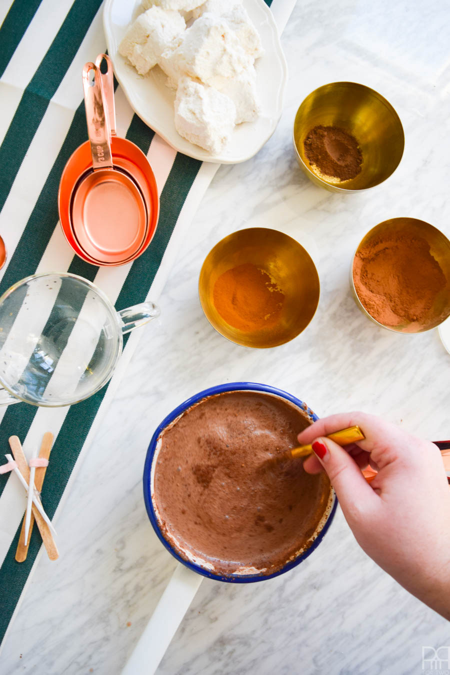 Cuddle up with a warm cup of Spicy Hot Chocolate & Homemade Marshmallows this winter. The recipe is dead simple, super tasty, and very appropriate for winter activities.