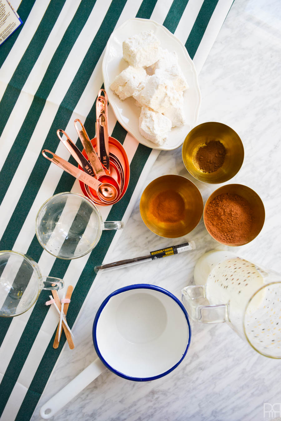 Cuddle up with a warm cup of Spicy Hot Chocolate & Homemade Marshmallows this winter. The recipe is dead simple, super tasty, and very appropriate for winter activities.