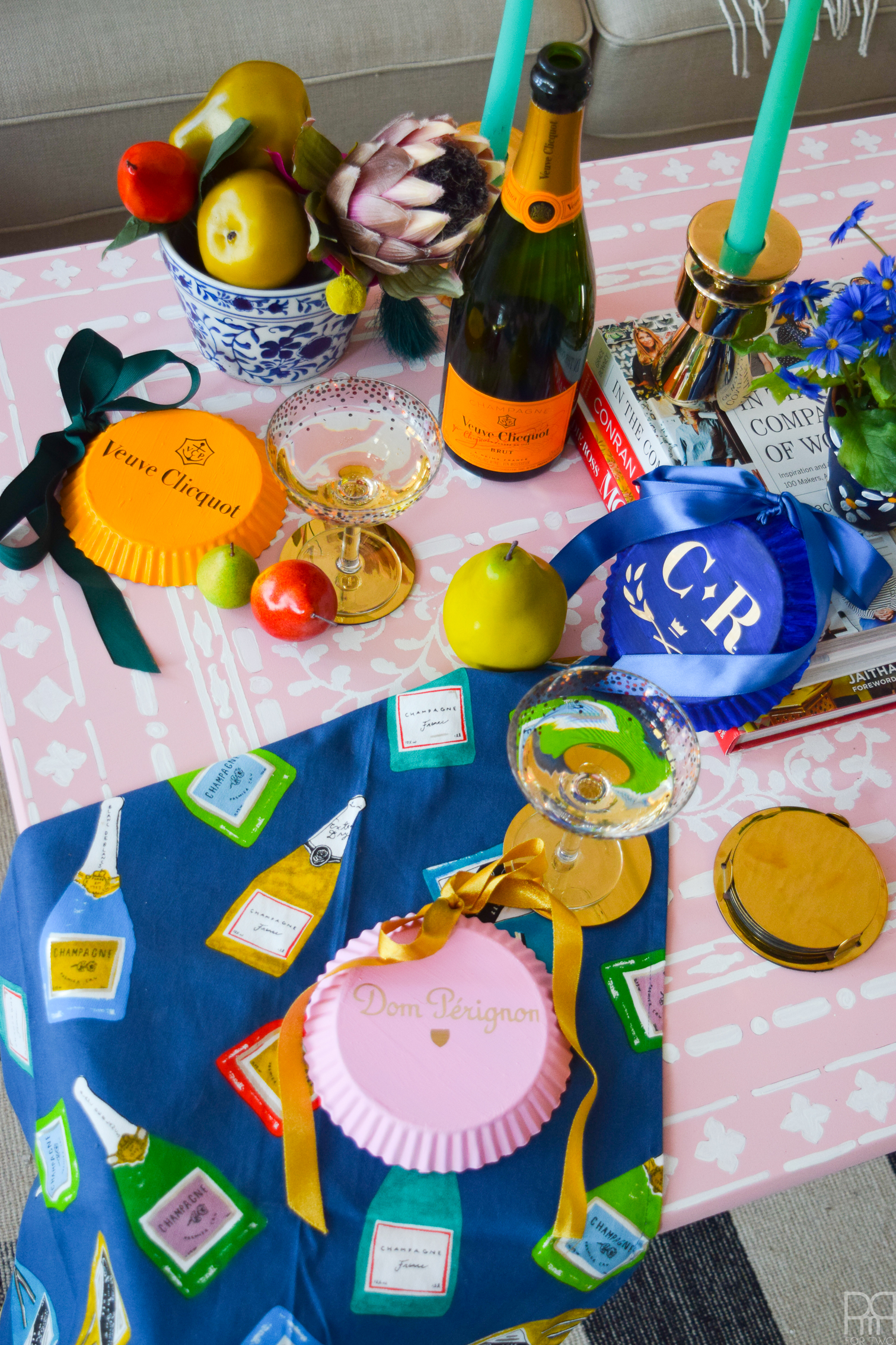 Always pick up the random things in the craft store, because you never know when they will turn into DIY Champagne Bottle Tops. Using some Americana acrylic paint and your Cricut Explore Air 2, create bar cart extravaganza!