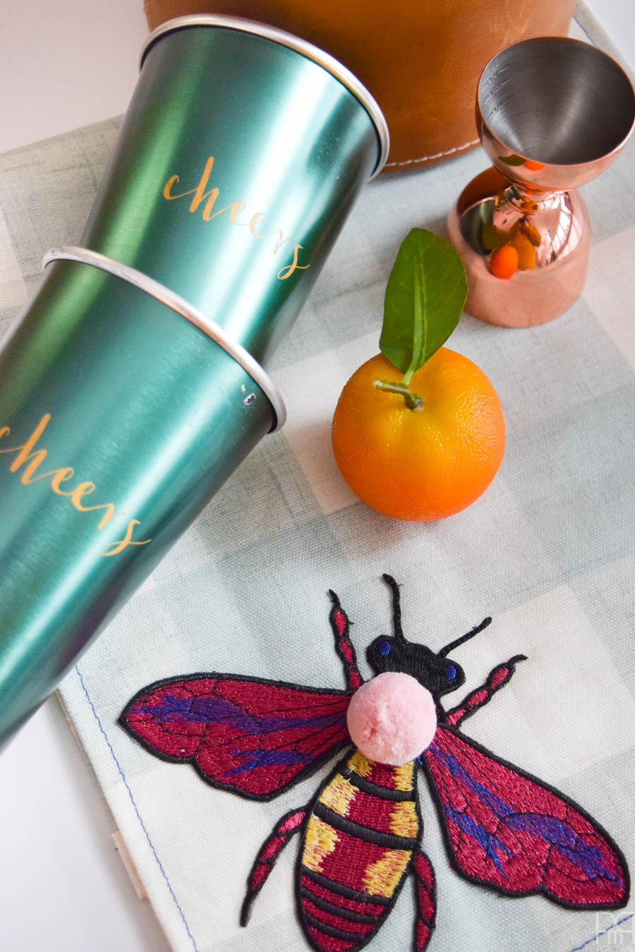 Inspired by the hit runway fashion trend, these DIY Gucci Inspired Tea Towels are easier to make than you'd think! Grab some fun fabric prints and these affordable iron-on patches, and you're ready to go!