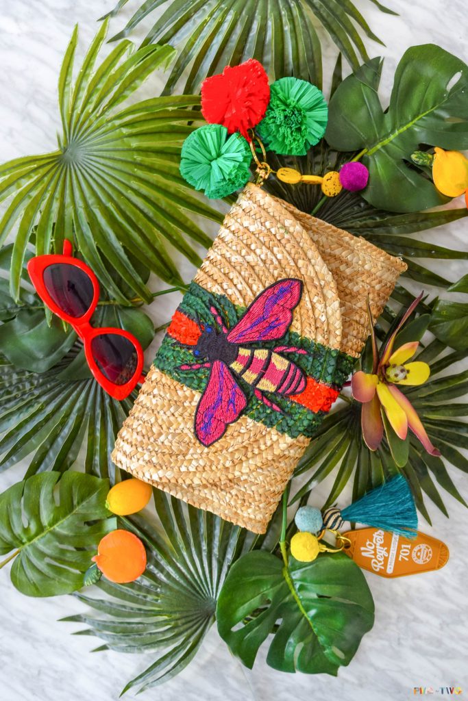 My gucci inspired straw clutch cost me a grand total of about 20$, took less than an hour to make, and is going to be an absolute hit this summer. So what are you waiting for? Get your hands on some raffia pom poms and paint.