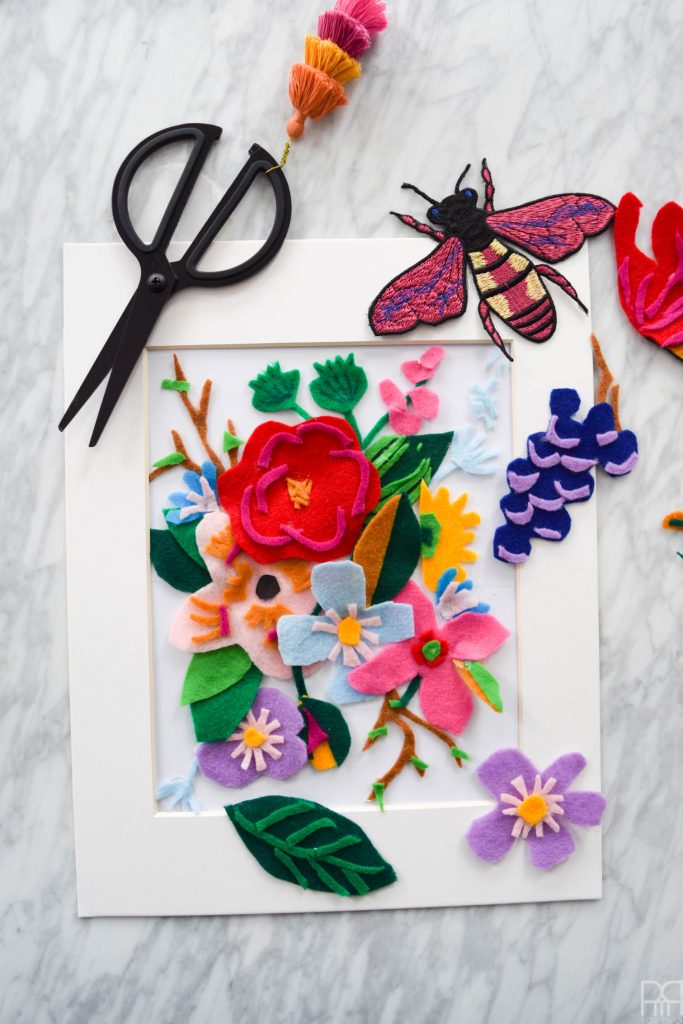 Bold, vibrant florals take on another dimension with this DIY Felt Flower Art Print. Made using crafting felt and a lot of glue, create a little slice of spring for under 10$.