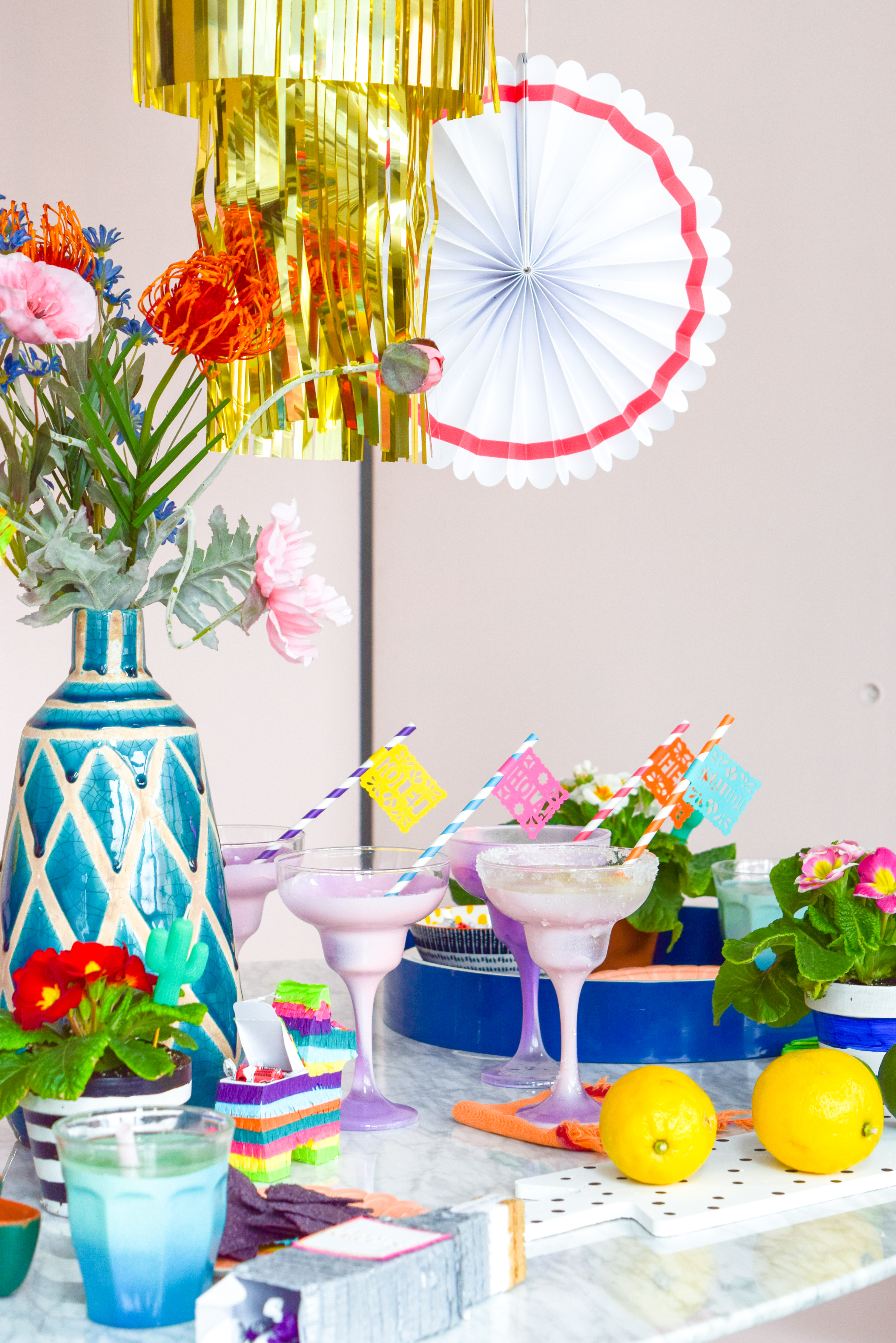 A Cinco de Mayo Party - from start to finish - to help you get the party started! Come see what I made and bought, for this colourful fiesta. Hint: lots of mini pinatas, colourful paper picado, and cocktails. Now, where's my margarita?