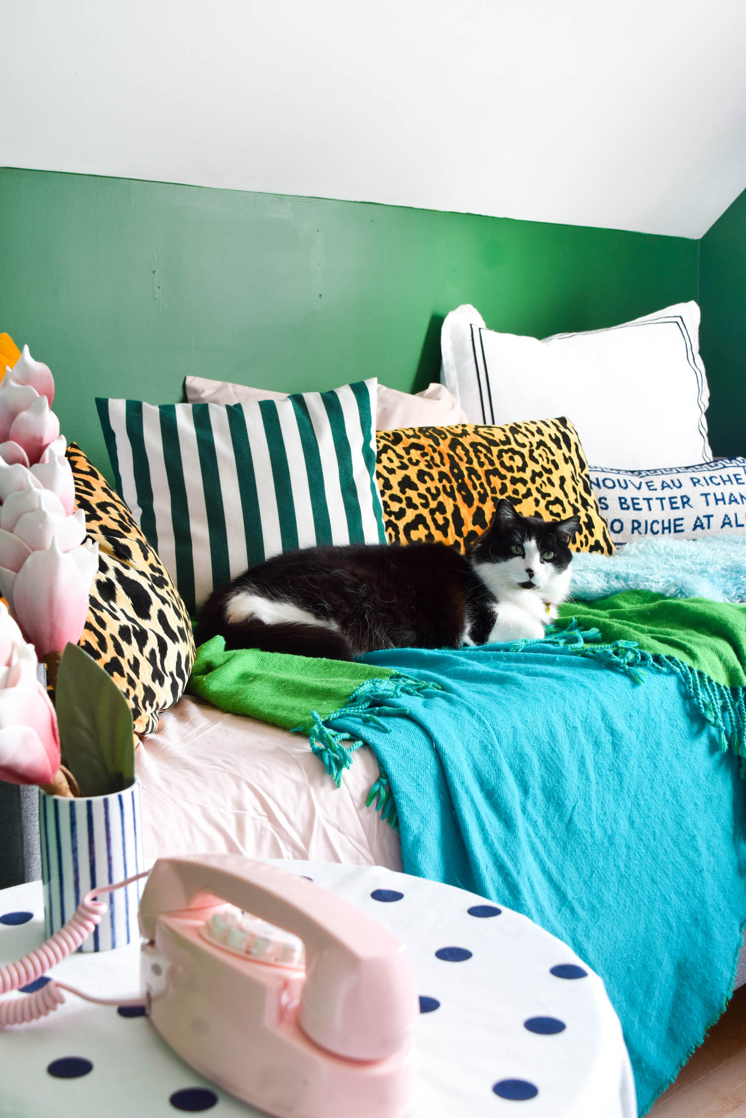 A Colourful & Eclectic Guest Room (& office) that looks like it came straight from a magazine! Full of charm and curated finds. Come see how we make an MCM daybed work with a buffalo plaid dresser and lots of saturated hues.