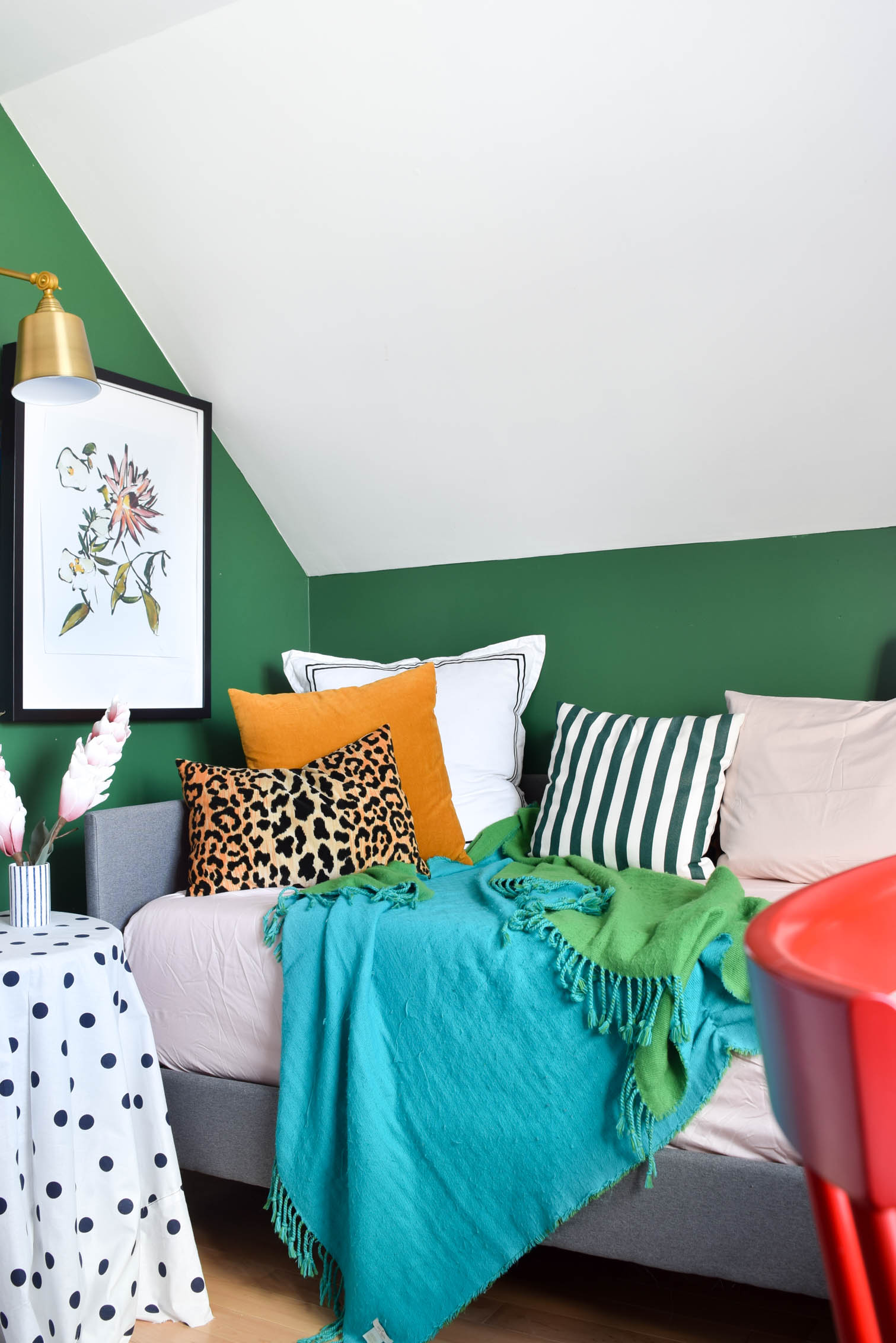 A Colourful & Eclectic Guest Room (& office) that looks like it came straight from a magazine! Full of charm and curated finds. Come see how we make an MCM daybed work with a buffalo plaid dresser and lots of saturated hues.