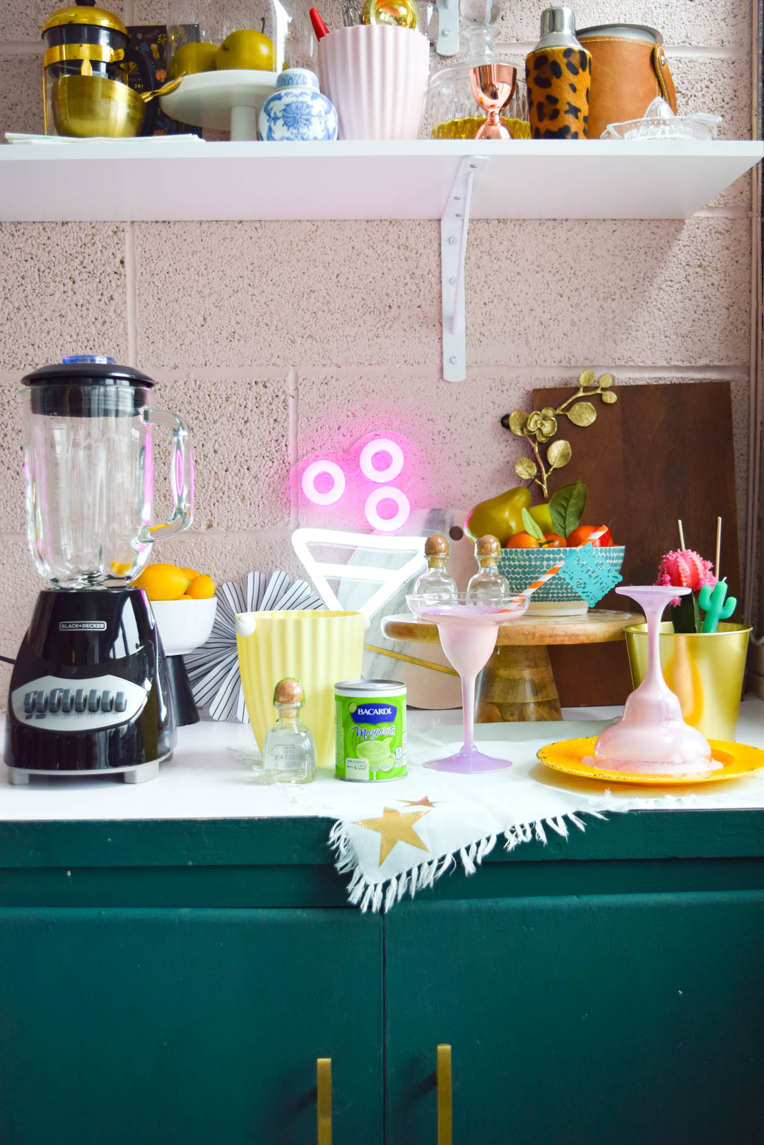 DIY Ombre Margarita Glasses (and margaritas!) to help you get your drank on. All you need is Krylon spray paint and some miss-matched glasses from the thrift store.