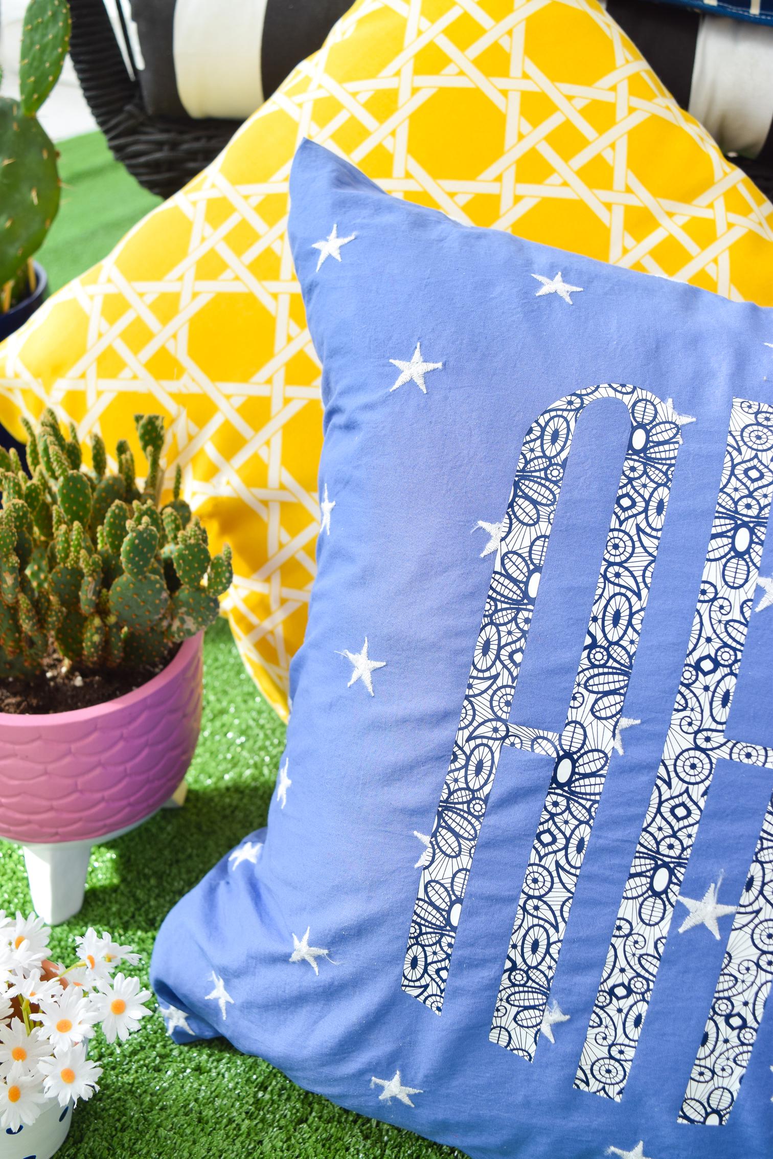 Patterned Iron on Monogram Pillows are where it is at this season. Get your hands on Cricut's new pattern samplers, and create some funky, retro cool pillows for your home now.