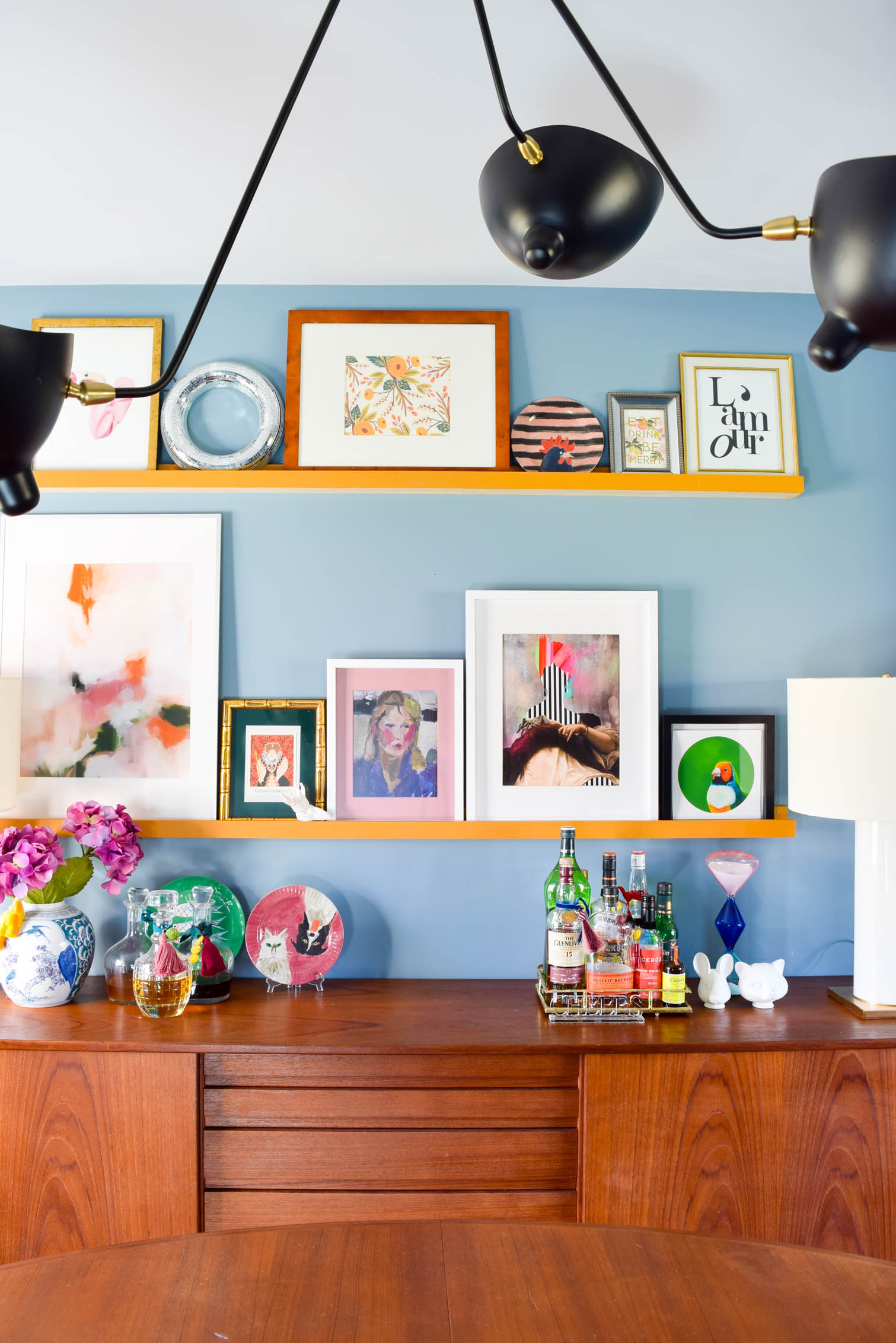 A DIY Picture Rail upgrade in our dining room has proven to be a game changer. Everything is so organized, and the scale feels just right! They only cost about 30$ to build, and it too less than a day!