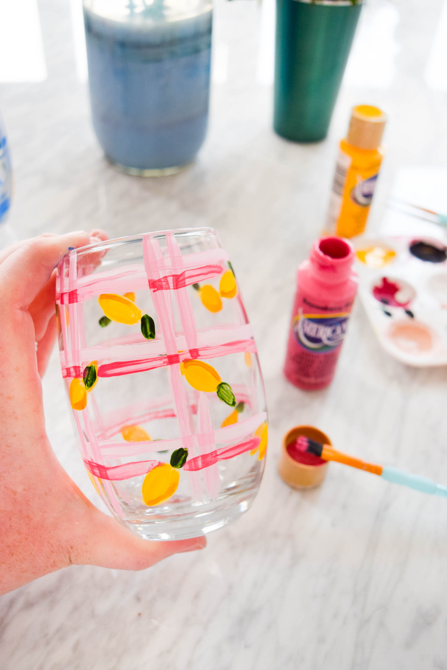 My DIY Painted Plaid & Lemon Glasses are the cutest thing you'll see all day. You can make your own summer drinkware with a retro and fun vibe, in just an afternoon.