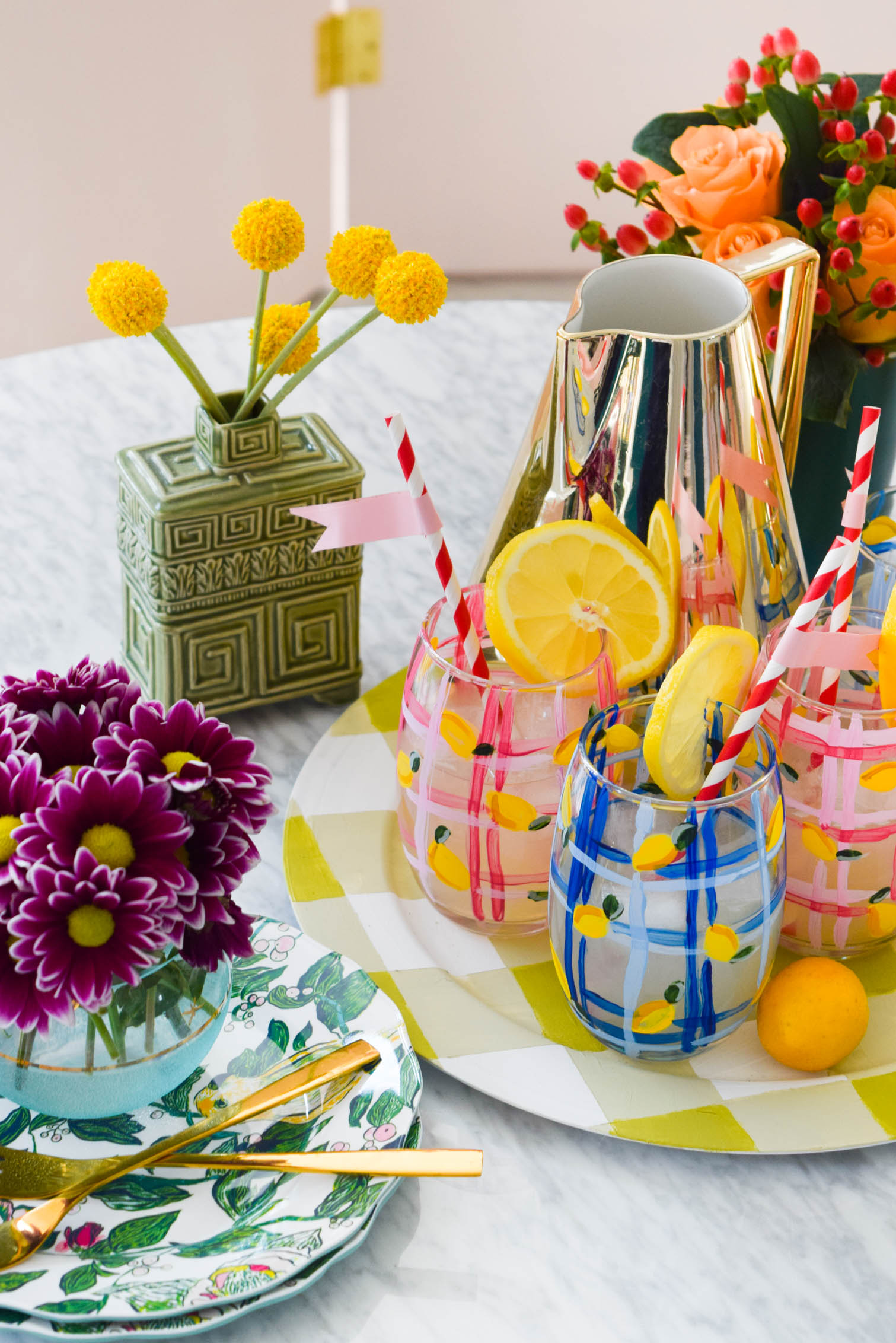 My DIY Painted Plaid & Lemon Glasses are the cutest thing you'll see all day. You can make your own summer drinkware with a retro and fun vibe, in just an afternoon.