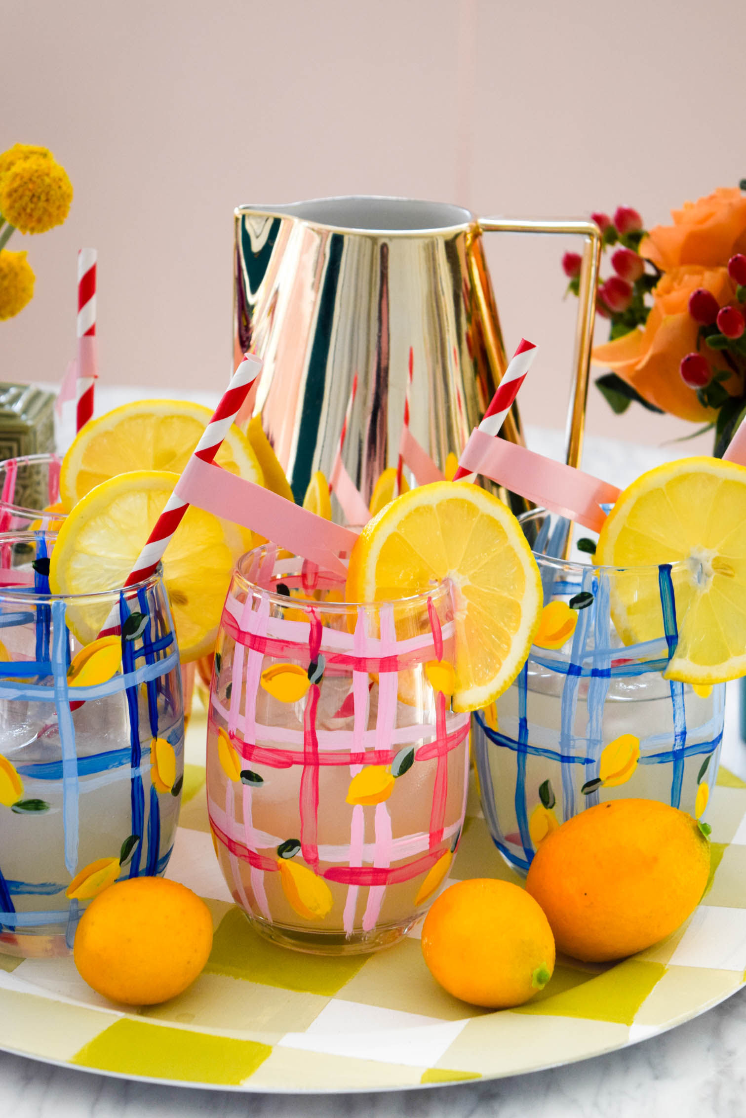 My DIY Painted Plaid & Lemon Glasses are the cutest thing you'll see all day. You can make your own summer drinkware with a retro and fun vibe, in just an afternoon.