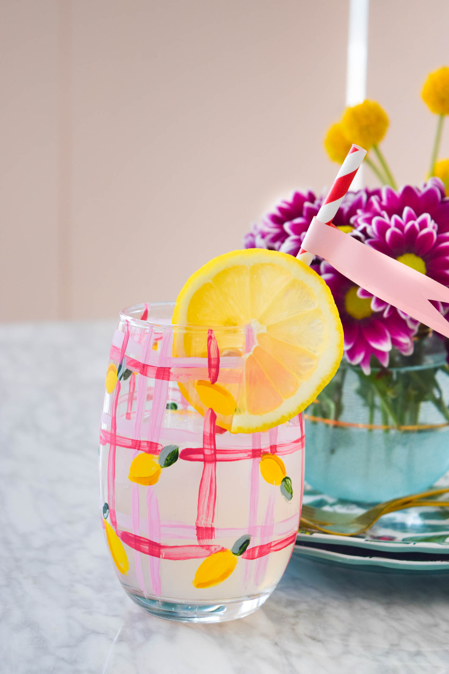 My DIY Painted Plaid & Lemon Glasses are the cutest thing you'll see all day. You can make your own summer drinkware with a retro and fun vibe, in just an afternoon.