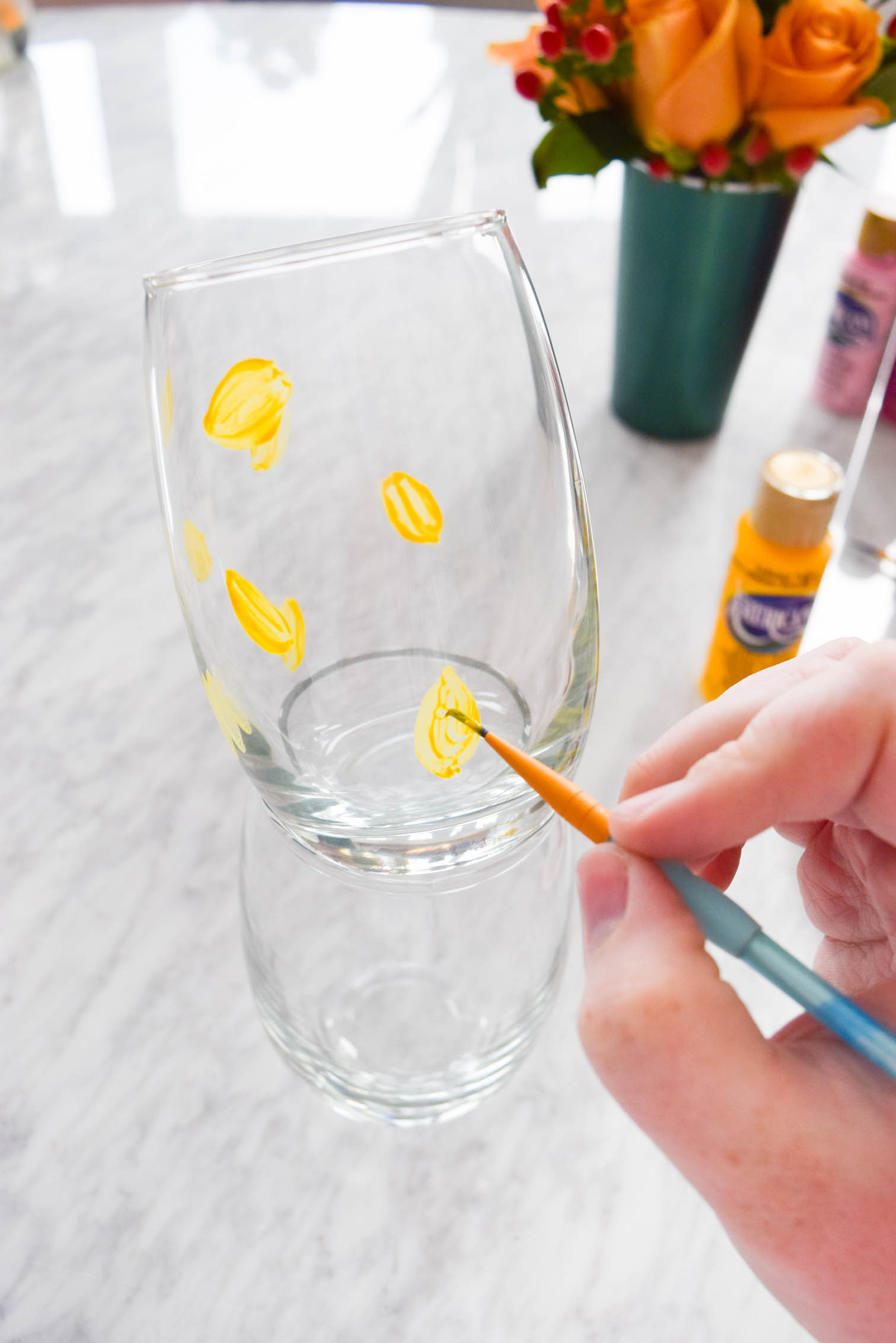 My DIY Painted Plaid & Lemon Glasses are the cutest thing you'll see all day. You can make your own summer drinkware with a retro and fun vibe, in just an afternoon.