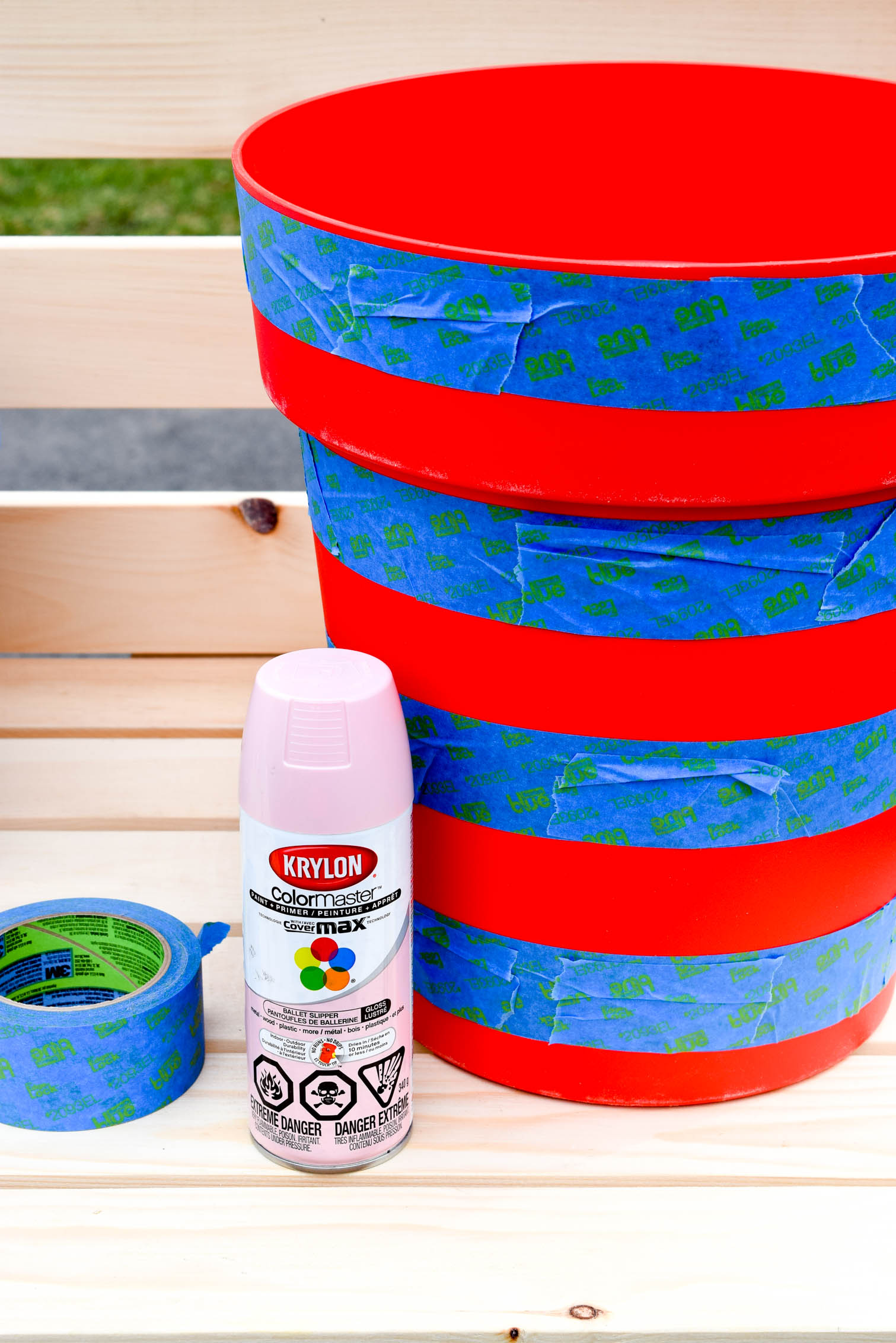 Create the colour coordinated front porch situation of your dreams with DIY spray painted striped planters using the Krylon & Tiffany Pratt colour collection.