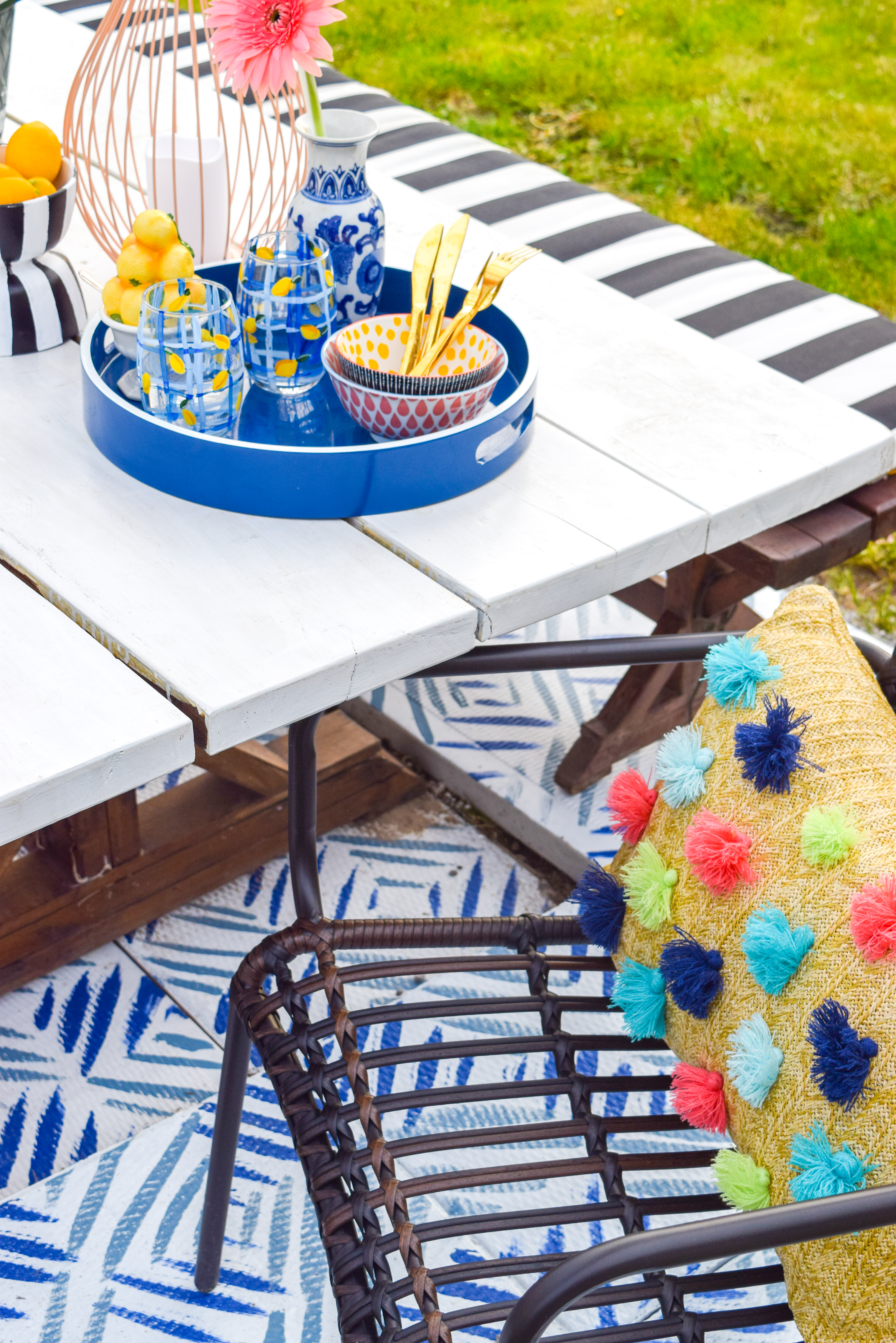 Looking for a renter friendly update to your backyard in time for summer? Try painted some cement pavers to look like patio tiles, using Decoart's Curb Appeal line of paints.