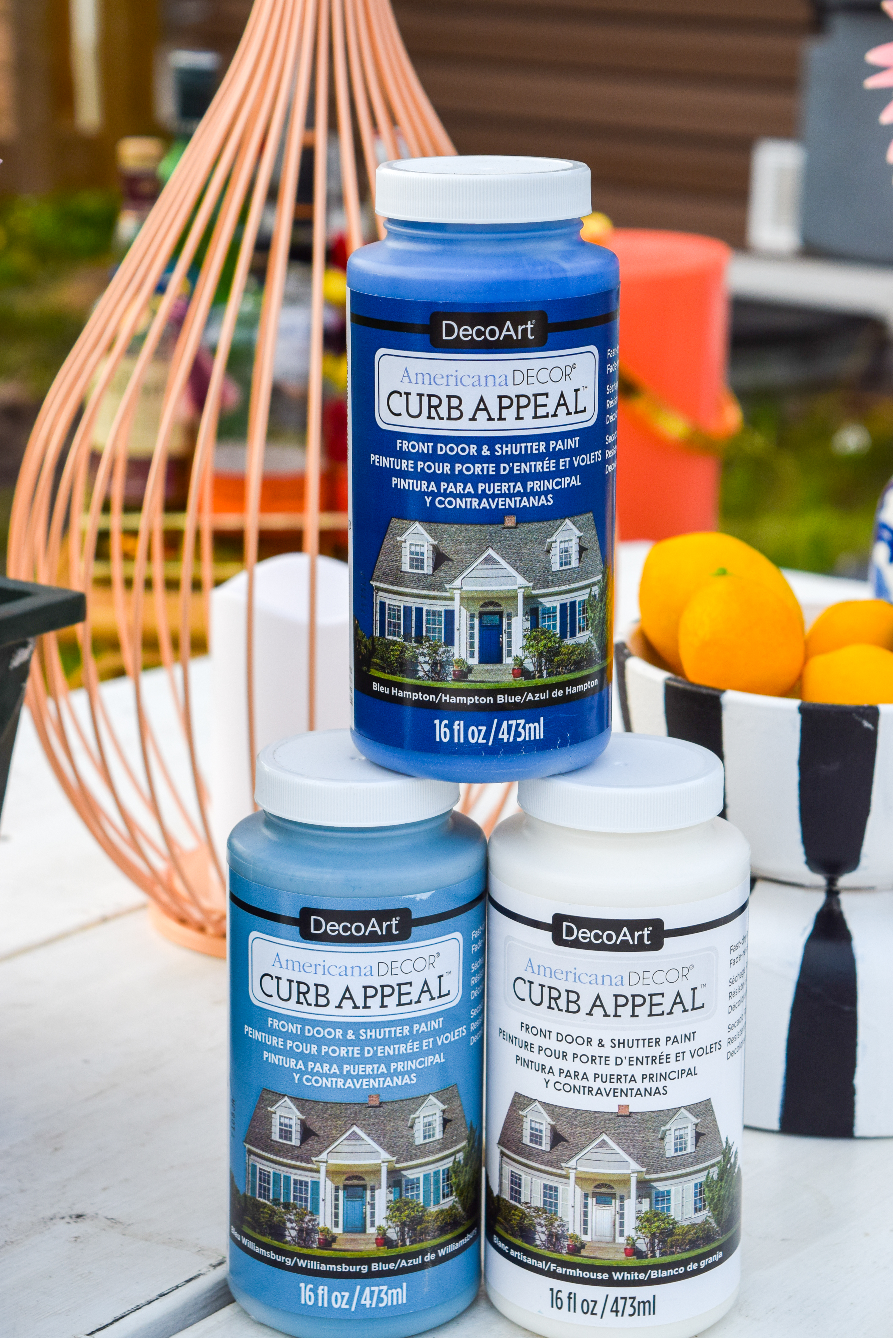 Looking for a renter friendly update to your backyard in time for summer? Try painted some cement pavers to look like patio tiles, using Decoart's Curb Appeal line of paints.